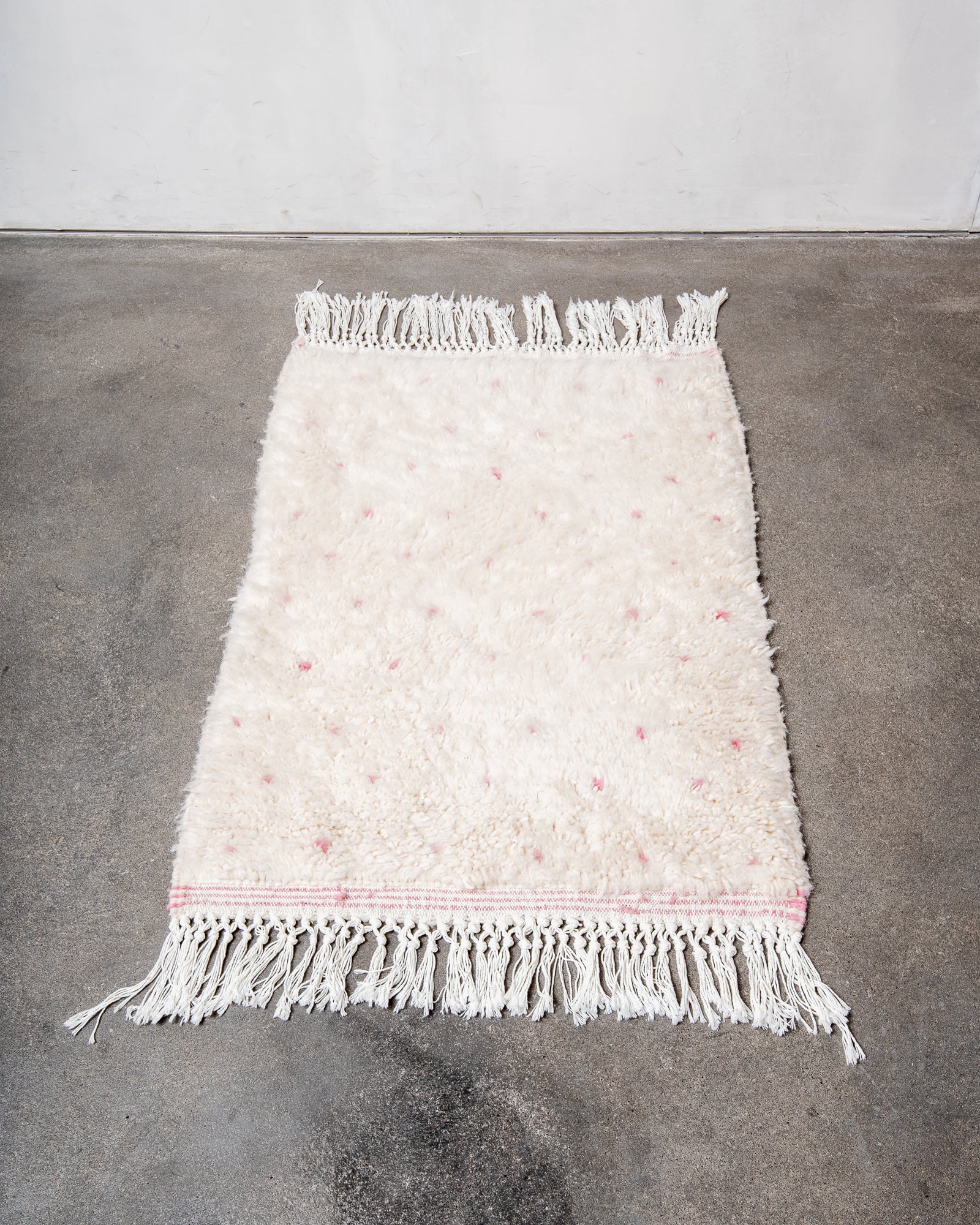 Modern, designer, handcrafted Berber rug from Morocco. Beniourain carpet with beautiful colours and patterns and fluffy wool texture.